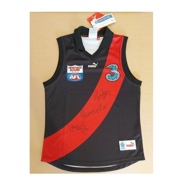 ESSENDON HERITAGE JUMPER SIGNED BY BROWNLOW HIRD MOSS & WANGANEEN